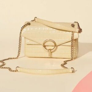 SANDRO Yza bag in cream / white